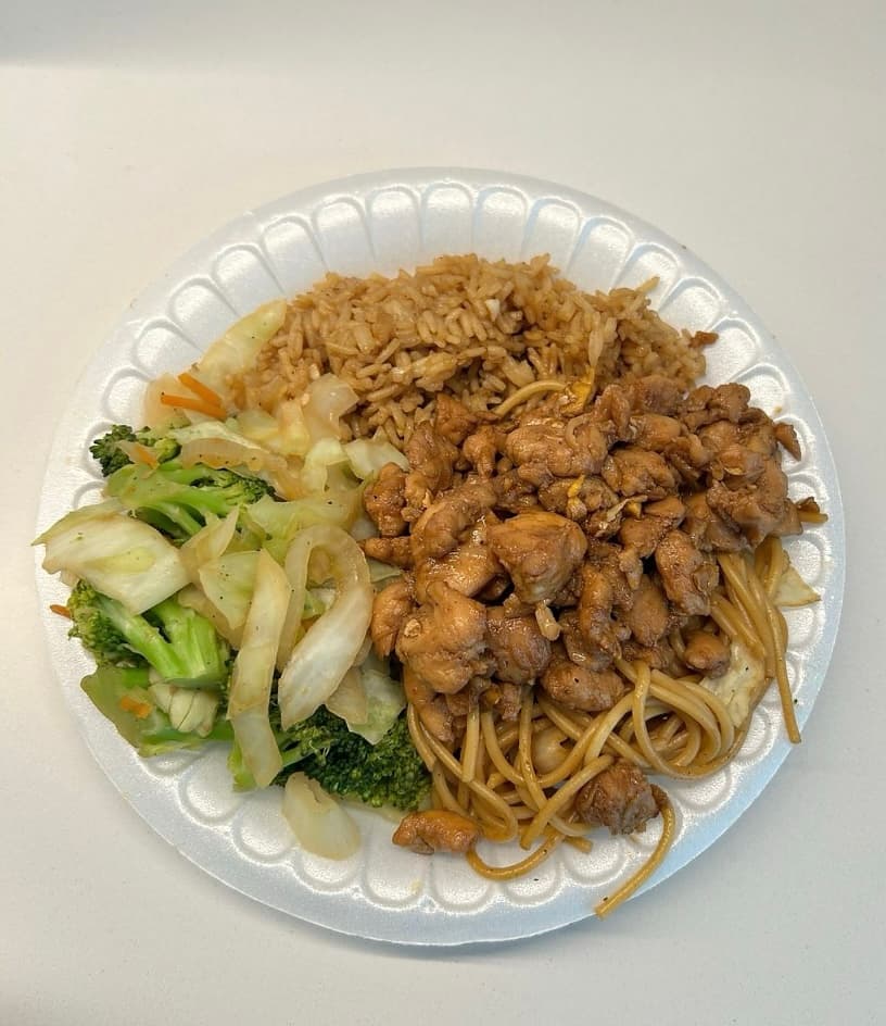 Teriyaki chicken with fried rice, lo mein, and vegetables—Asian-inspired catering plate